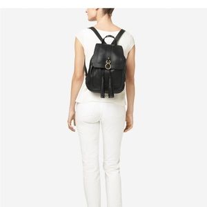 COLE HAAN Cassidy Backpack in black leather.